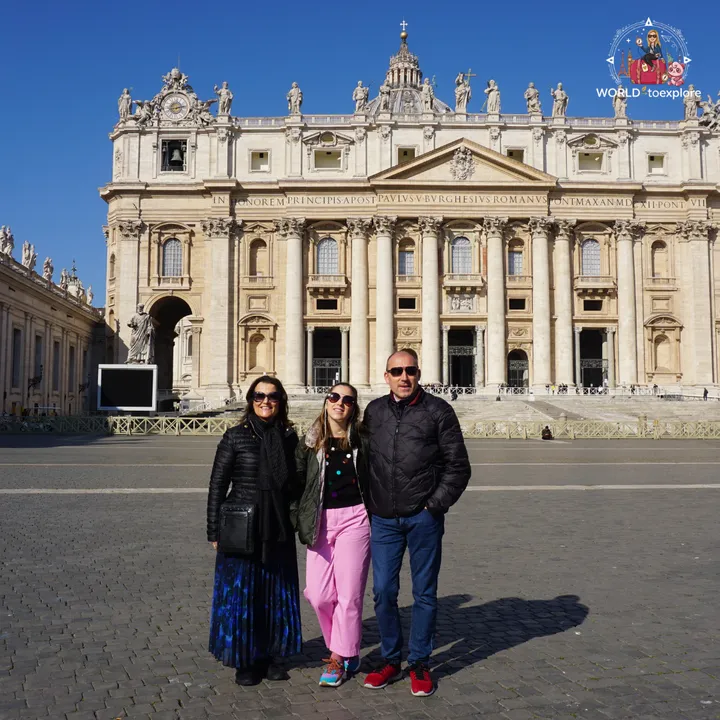 The author with her parents in front of the façade of St Peter's Basilica, in the still empty square