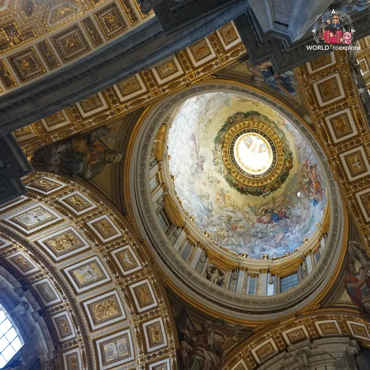 One of the smaller domes of the basilica, decorated with frescoes and framed by the gilded coffered ceiling