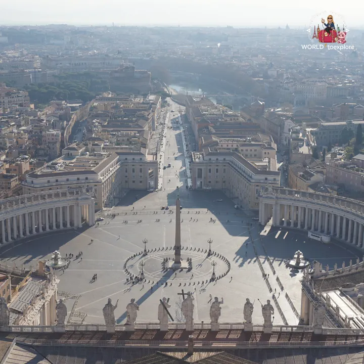 View of St Peter's Square from the top of the dome, with Bernini's colonnade, the obelisk and the avenue leading to the river Tiber