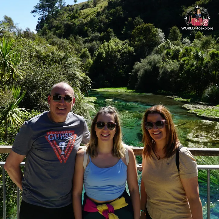 The author with her parents on the Blue Spring viewing bridge, with the crystal-clear spring in the background