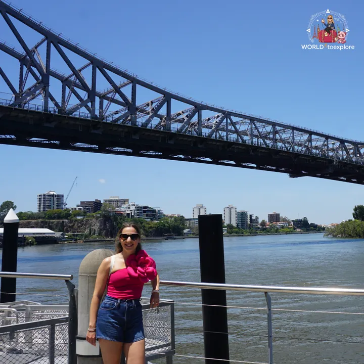 Under the Story Bridge, the steel cantilever bridge over the Brisbane River, with the Kangaroo Point cliffs in the background