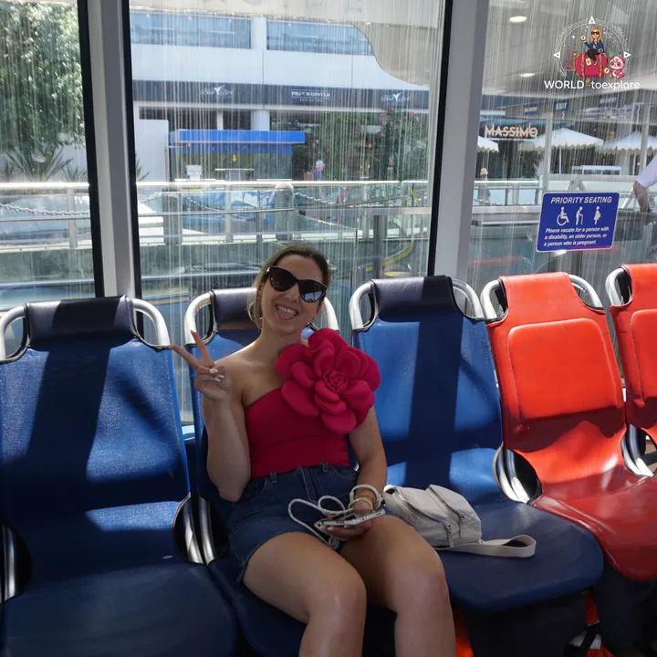 On board a CityCat ferry, with its blue and orange seats