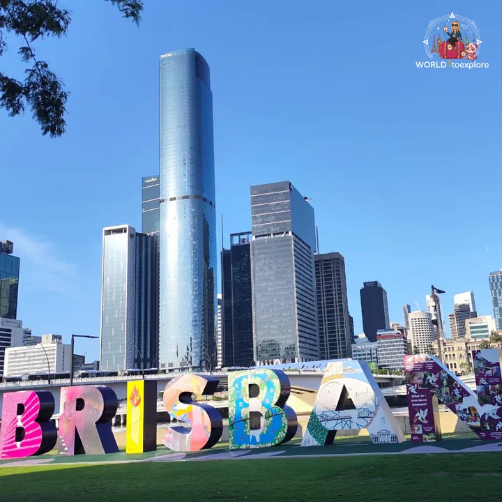 The colourful 'BRISBANE' sign at South Bank, with the skyline behind