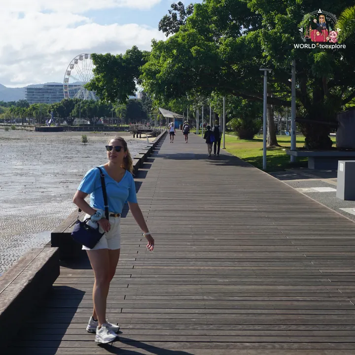 Walking along the Esplanade boardwalk, with the ferris wheel in the background