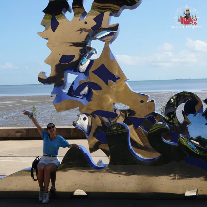 By the Citizens Gateway to the Great Barrier Reef sculpture, on the Esplanade