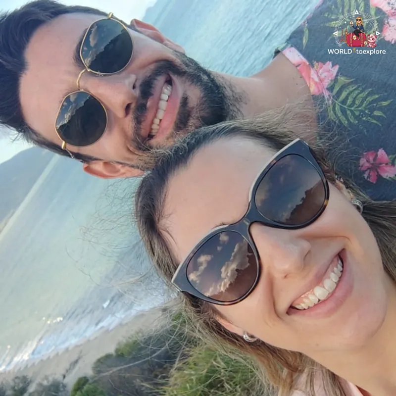 Couple selfie at Rex Lookout, with the sea behind