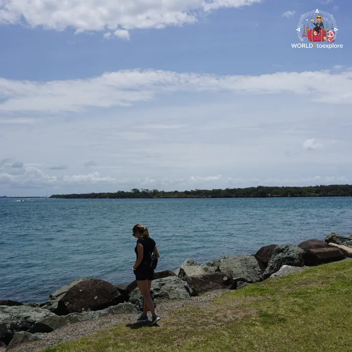 By the Gold Coast Seaway channel, on the rocks, with the sea beyond