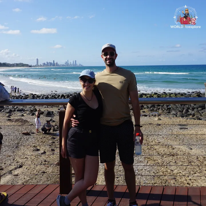 On the Burleigh Heads boardwalk, with the headland, the ocean and Surfers Paradise behind
