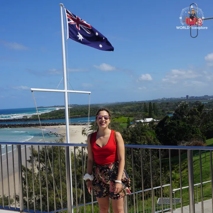 At the Point Danger lookout, by the flagpole with the Australian flag