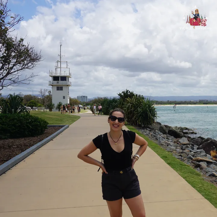 On the boardwalk at The Spit, with the Seaway lookout tower behind