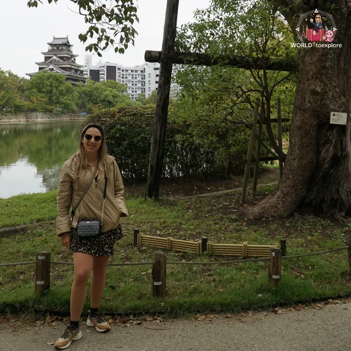 By the moat of Hiroshima Castle, with the main keep in the background across the water