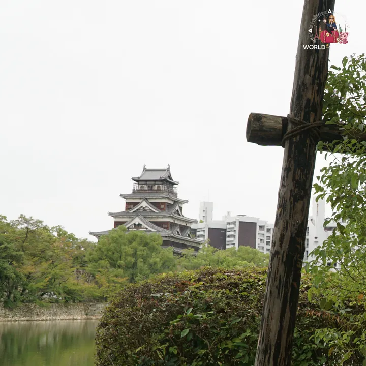The main keep of Hiroshima Castle seen from across the moat, among the greenery