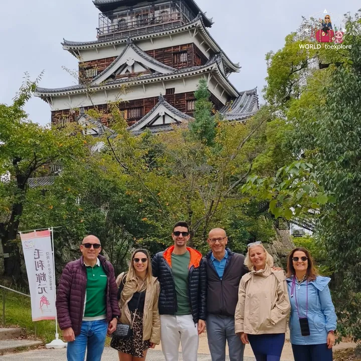 As a group, in front of the main keep of Hiroshima Castle