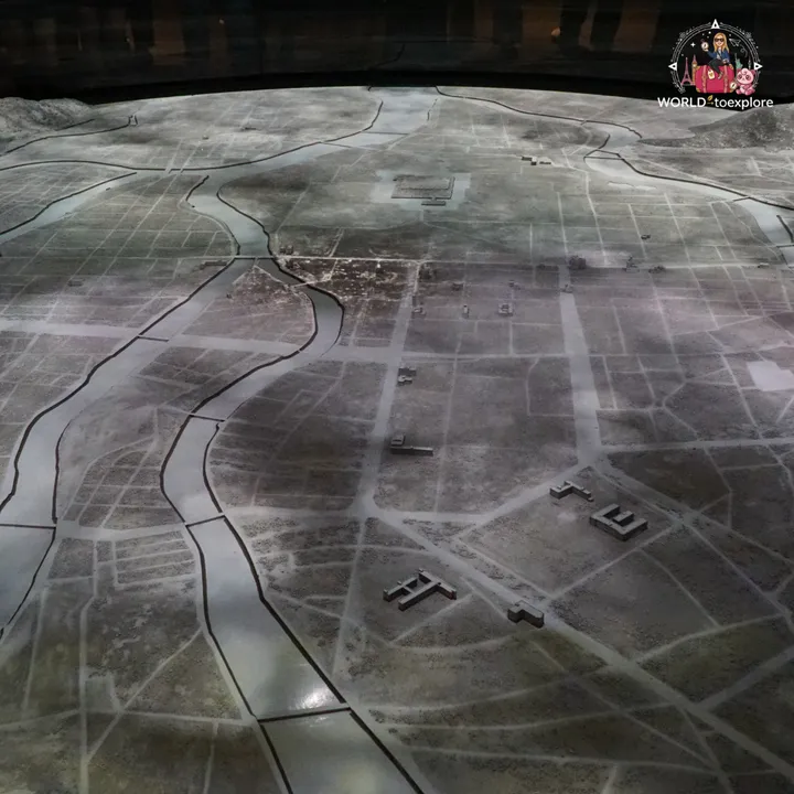 A model of the city flattened by the bomb, showing Hiroshima's rivers and only a few buildings left standing