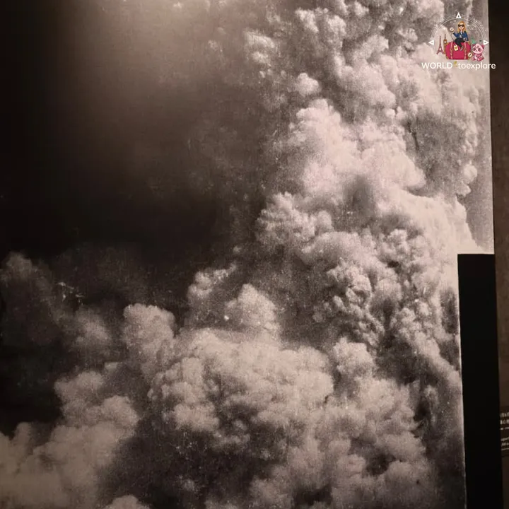 Black and white photograph of the huge column of smoke that rose over Hiroshima after the explosion