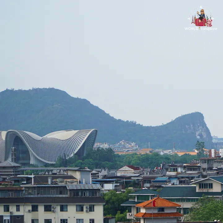 Panoramic view of Guilin from Diecai Hill, with the Grand Theatre and karst mountains in the background