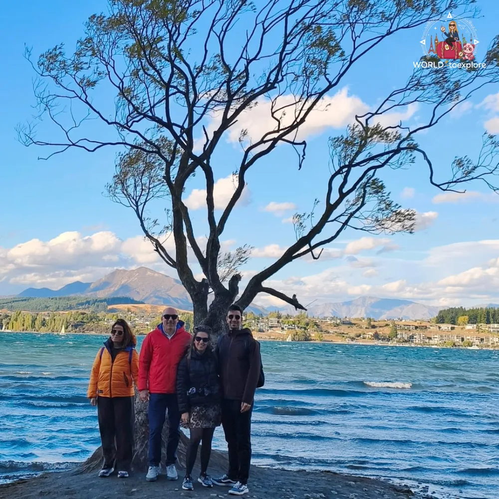 The family by "That Wanaka Tree", in Wanaka