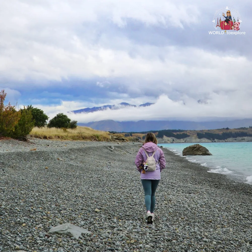 Pebble shore of Lake Pukaki, of milky blue