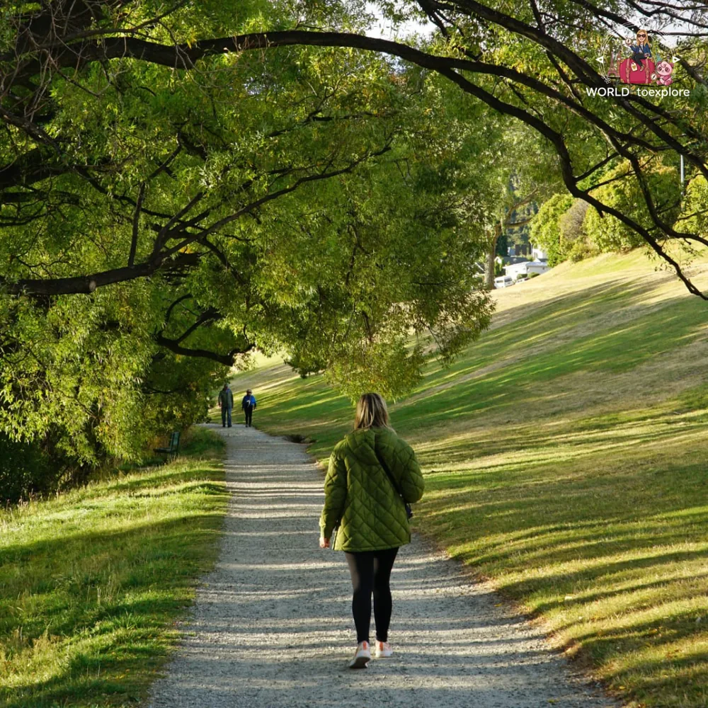 Tree-lined walk on Frankton Beach, by Lake Wakatipu, Queenstown