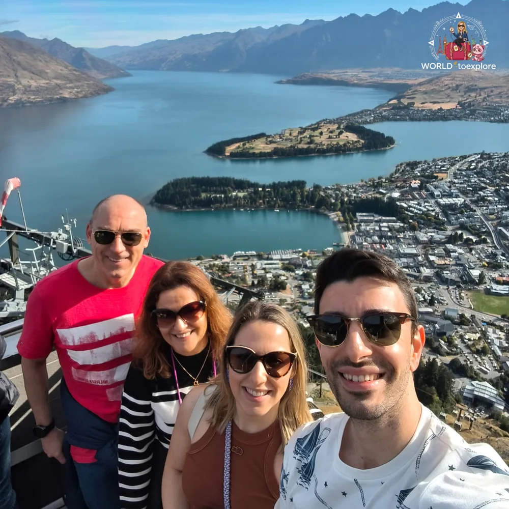At the top of Bob's Peak with Queenstown and Lake Wakatipu behind