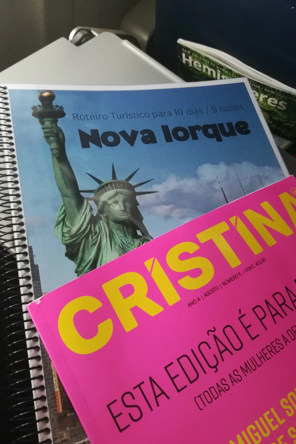 My travel itinerary and a magazine