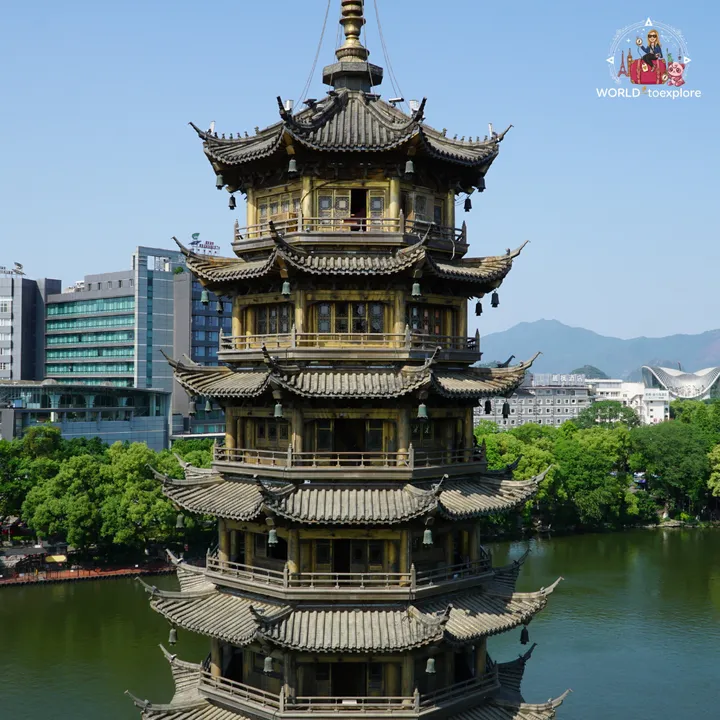 Close-up of the Sun Pagoda, with its golden bronze structure, by Shanhu Lake