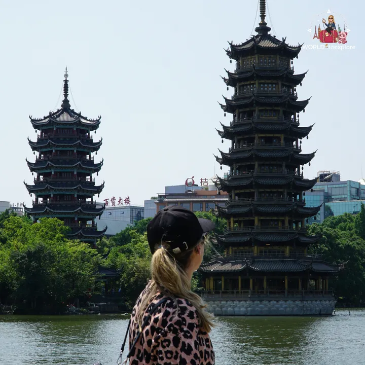 Cristina looking at the two pagodas from a distance, by Shanhu Lake