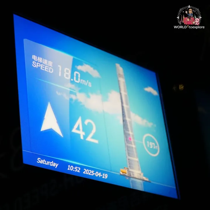 Screen in the Shanghai Tower lift showing the ascent speed and floor 42