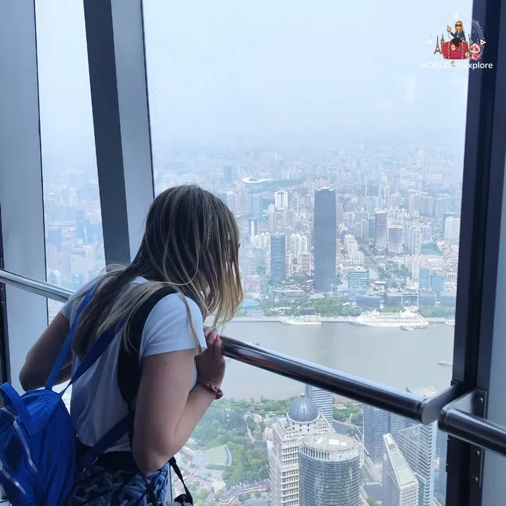 The author taking in the view over Shanghai from the Top of Shanghai observation deck
