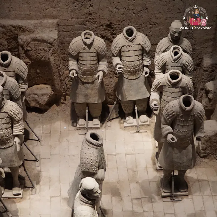 Headless terracotta warriors, awaiting restoration in a pit